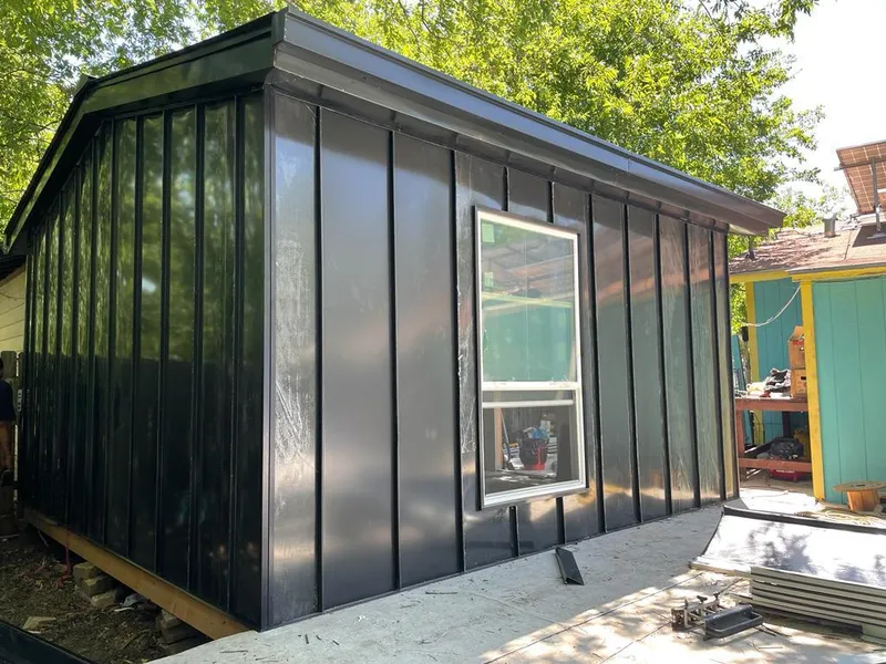 Black standing seam metal wall panels for Metal Roof Installation in Rye