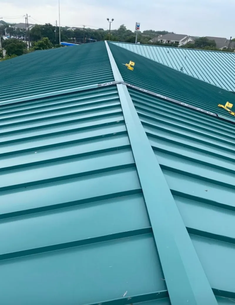 Green commercial metal roof ridge and valley for Metal Roof Repair in Rye